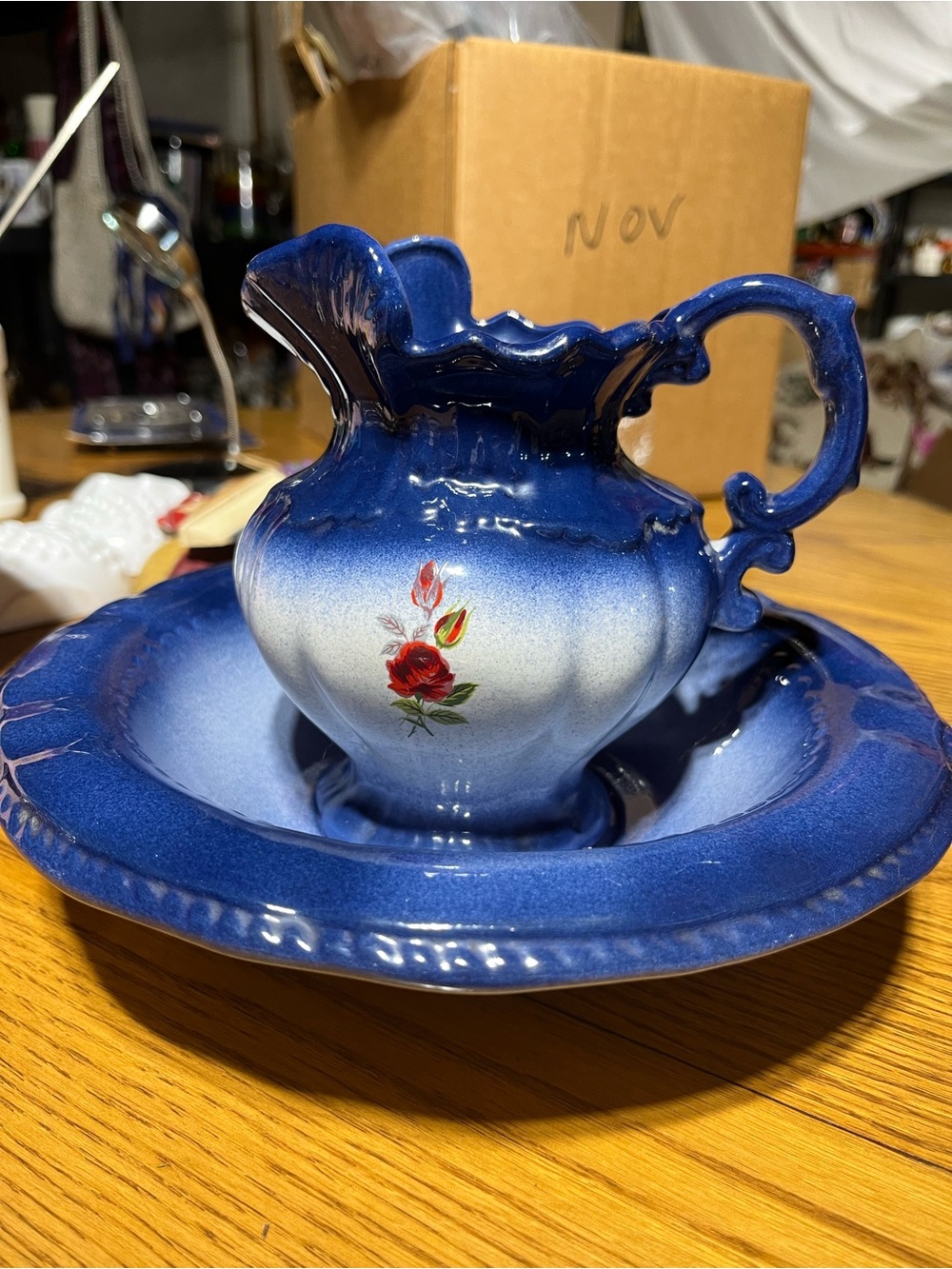 Blue Ceramic Pitcher and Basin with Red Rose Accent
